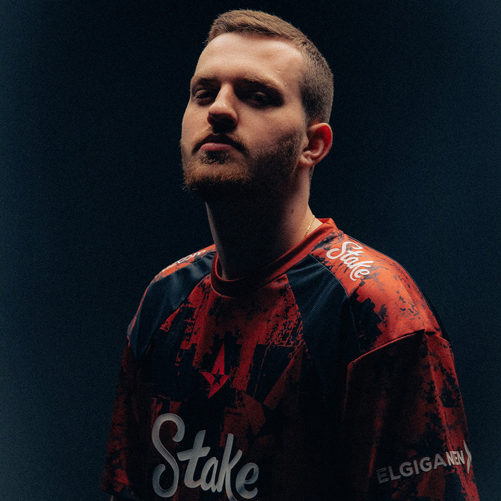 STAEHR wearing a red and blue jersey with Stake branding against a dark background
